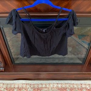 Tank top. Sleeves go off the shoulder